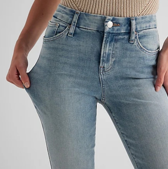 Express Mid Rise Light Wash Raw Hem FlexX '70s Flare Jeans - Picture 2 of 5